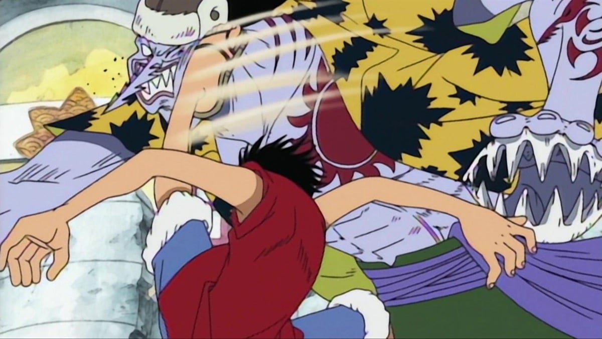 Luffy lands  a vicious kick on Arlong's face in "One Piece" 