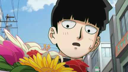 Mob holding a bouquet of flowers mere moments before our hearts get wrung out in Mob Psycho 100 III