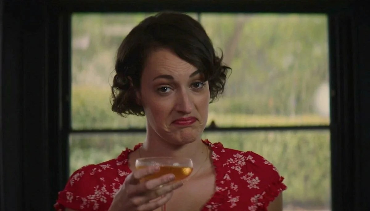 Phoebe Waller-Bridge raises a glass in a scene from 'Fleabag' season 2