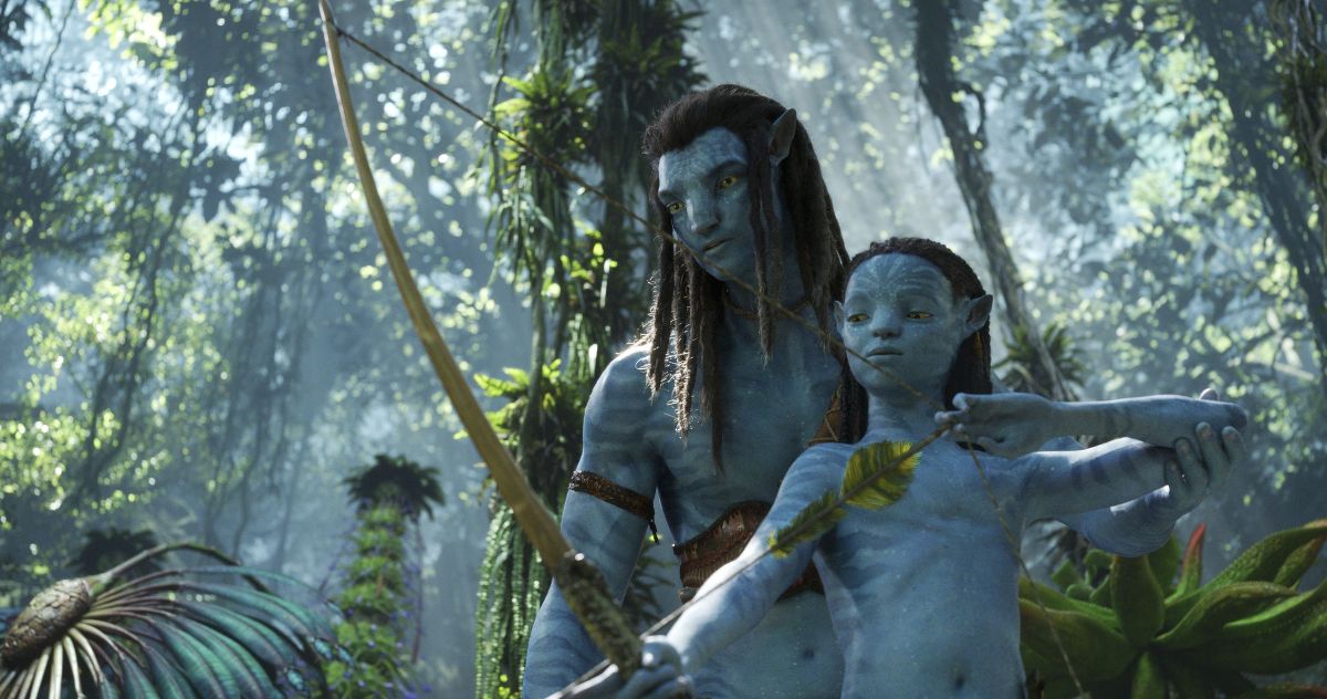 Jake Sully teaches his child how to use a bow and arrow in 'Avatar: The Way of Water'