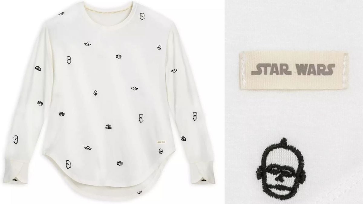 A long sleeve shirt with cartoon likenesses of Star Wars characters embroidered on it