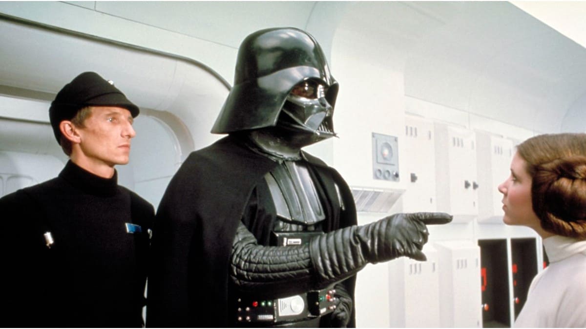 an Imperial officer, Darth Vader, and Princess Leia in A New Hope. 