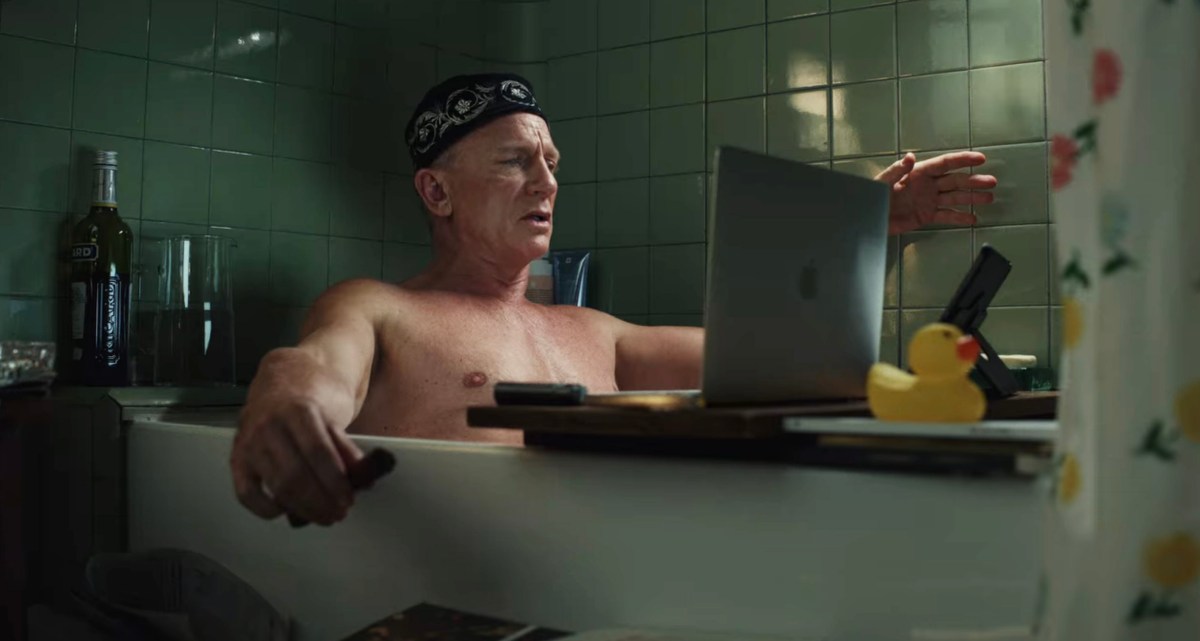 Daniel Craig as Benoit Blanc in the bath in Glass Onion