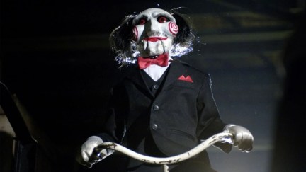Billy the Puppet being dramatic in Saw film