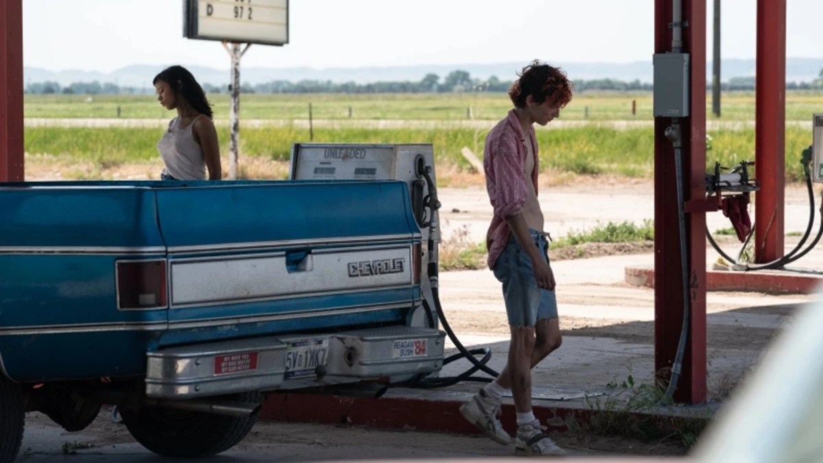 Maren and Lee at a car in Bones & All