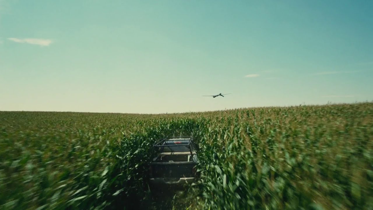 A truck plows through a field of corn in 'Interstellar'