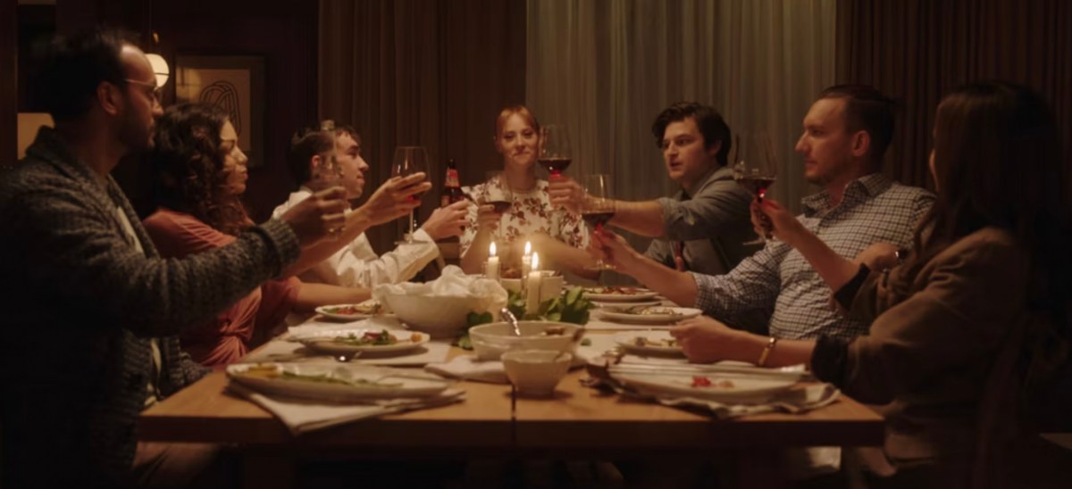 The cast of Deborah at a table