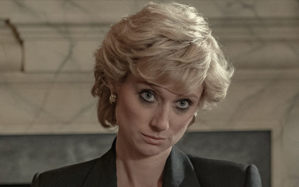 Elizabeth Debicki as Princess Diana, wearing a black blazer during her Panorama interview.