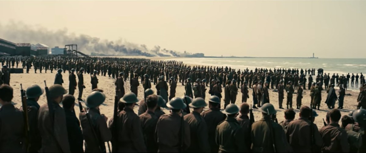 cardboard people standing in dunkirk