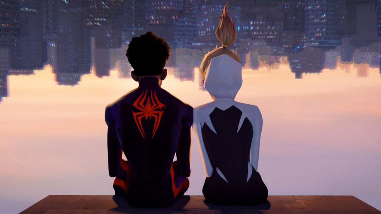 Miles Morales and Gwen Stacy sitting together in 'Spider-Man: Across the Spider-Verse'
