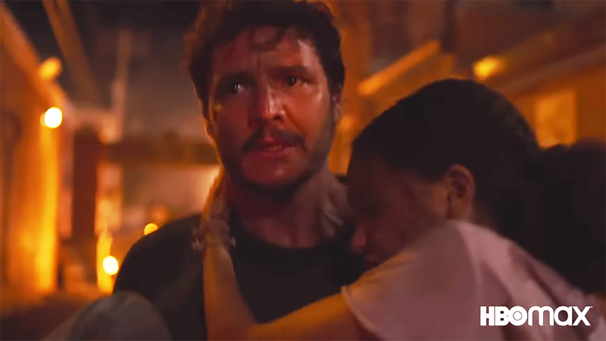 Pedro Pascal carrying Nico Parker in the trailer for 'The Last of Us'