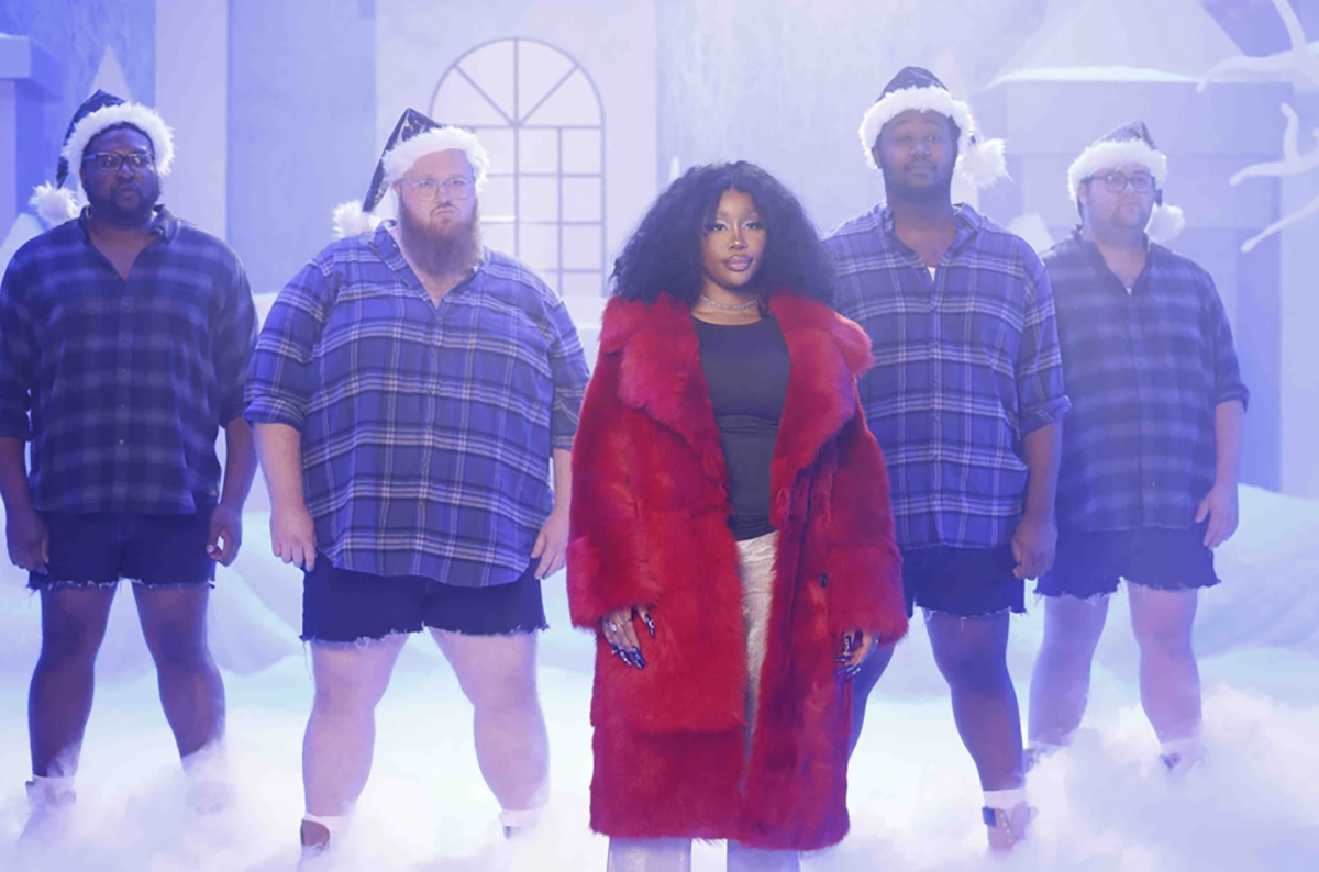 SZA with big boys in SNL