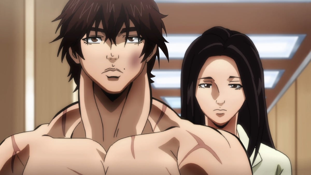 Baki and his mom stand in a hallway in "Baki" 