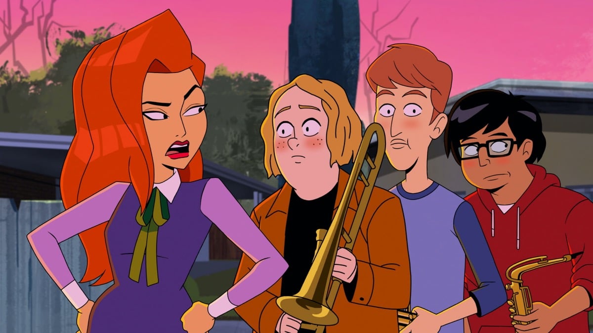 Daphne, voiced by Constance Wu, sasses a trio of band nerds in the animated series 'Velma'