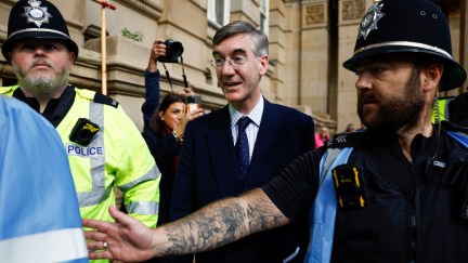 Jacob Rees-Mogg escorted to Tory Party conference by police