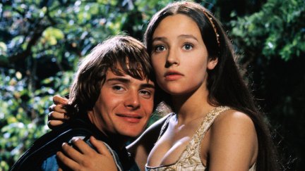 Leonard Whiting and Olivia Hussey embrace one another as the star crossed lovers in the 1968 film 'Romeo and Juliet'