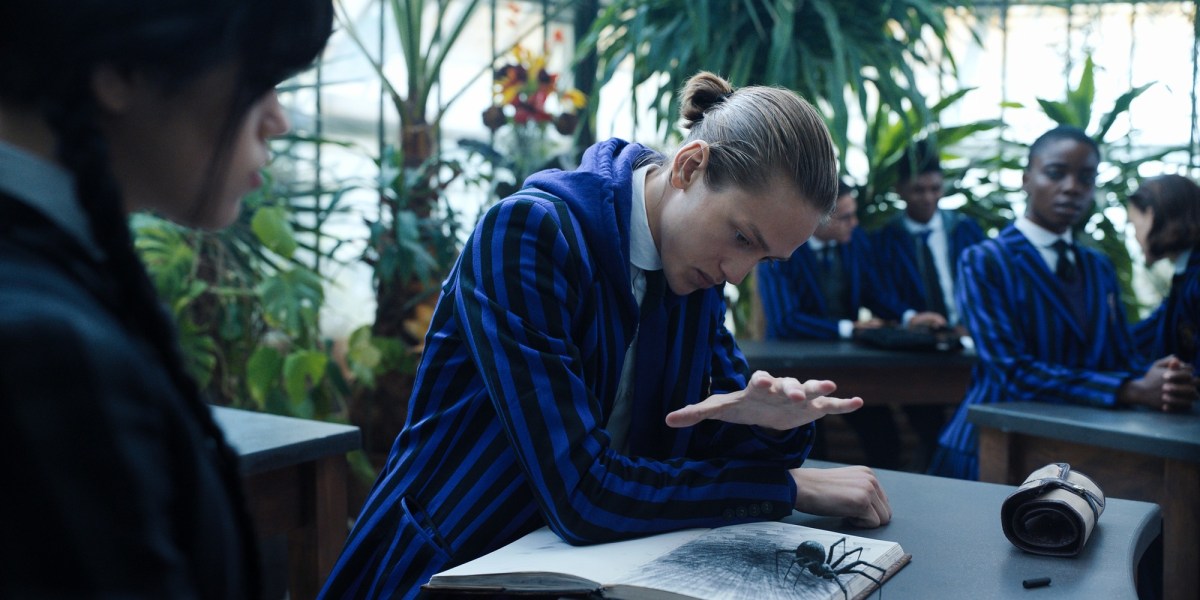 Percy Hynes White as Xavier drawing in Wednesday