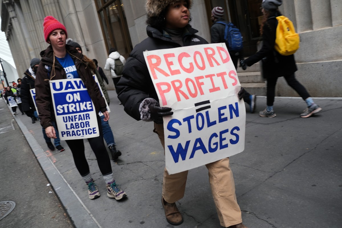 NEW YORK, NEW YORK - NOVEMBER 15: Employees of HarperCollins Publisher participate in a strike outside the company's offices in Manhattan on November 15, 2022 in New York City. The strikers, who work in a variety of departments at the company, have been bargaining for a union contract since December 2021. Salary, and a commitment to diversity and union security rights are some of the demands the workers have presented to the company. The union, Local 2110 of the UAW, represents more than 250 HarperCollins employees in the design, editorial legal, marketing, publicity, and sales departments. 