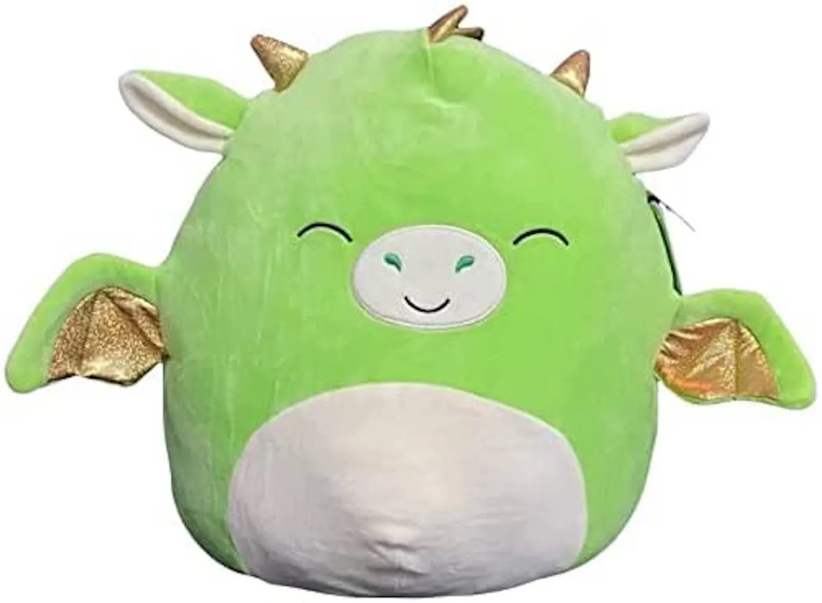 A green dragon Squishmallow with happy closed eyes