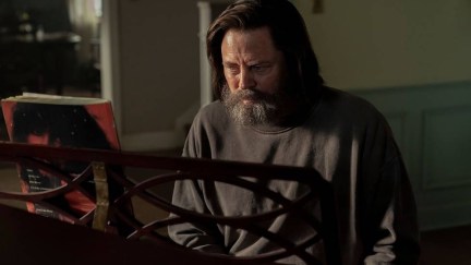 Bill (Nick Offerman) sits at the piano in The Last of Us.