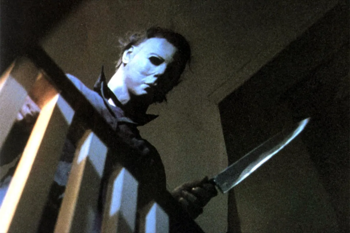 Michael Myers holding a knife in the first Halloween.