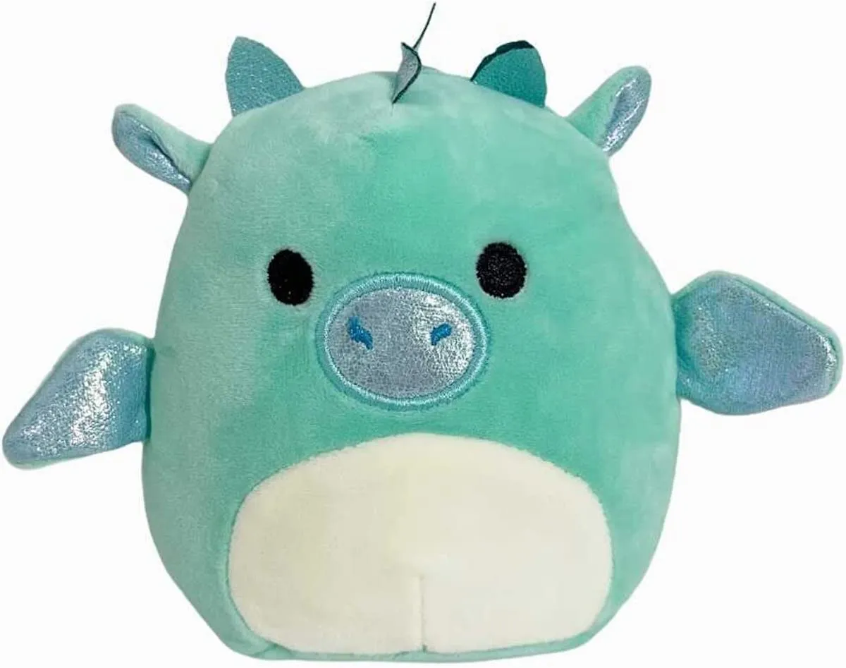 A pale blue Squishmallow dragon with silver wings and nose