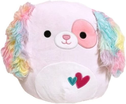 A pastel pink dog Squishmallow with long rainbow ears