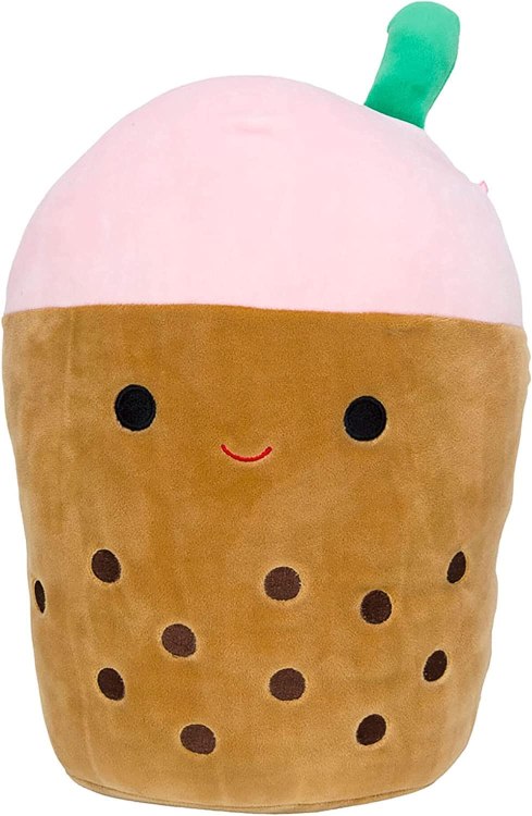 A brown boba tea Squishmallow with a pink cheese top