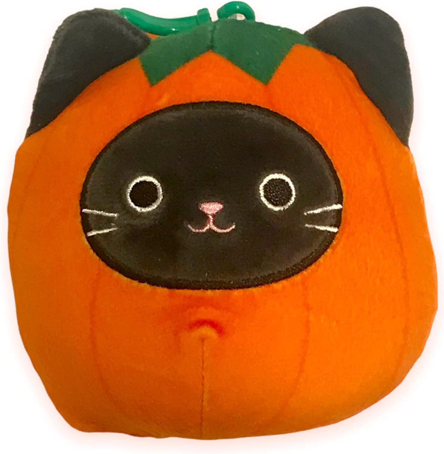 A black cat inside a pumpkin squishmallow.