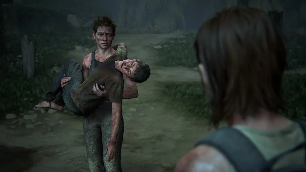 Ellie confronts a beat-up Abby, who is cradling an unconscious Lev in 'The Last of Us Part 2'