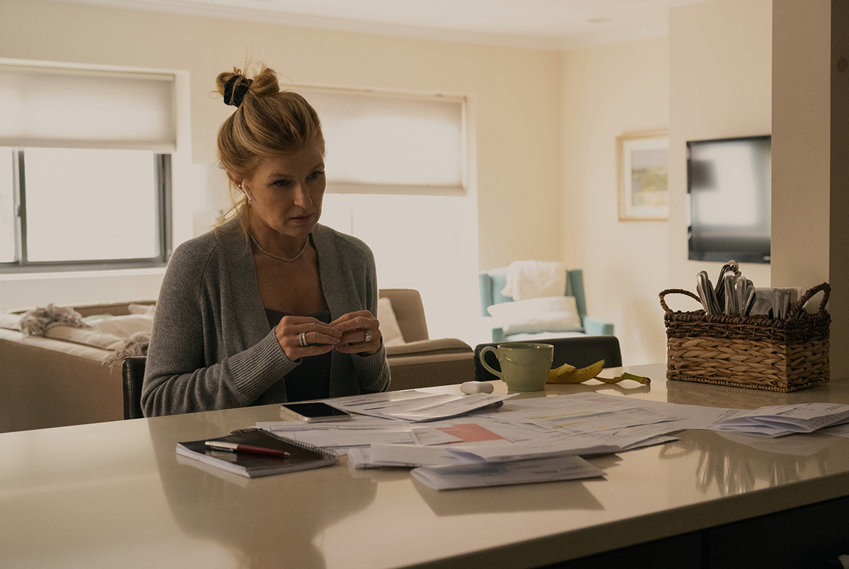 Connie Britton in Dear Edward at a table