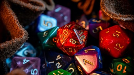 Close-up image of various colored role-playing gaming dice in a dice bag