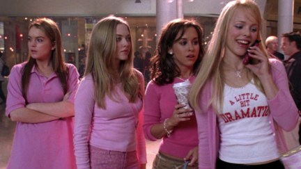 Cady, Karen, Gretchen, and Regina wear pink while standing in the mall in 'Mean Girls'.