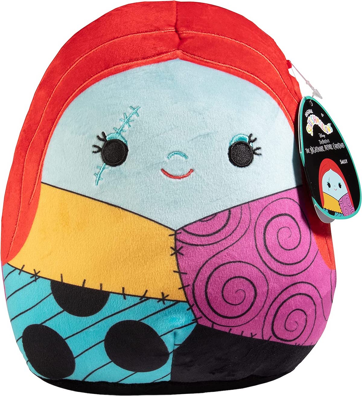 A blue skinned patchwork doll Squishmallow with red hair