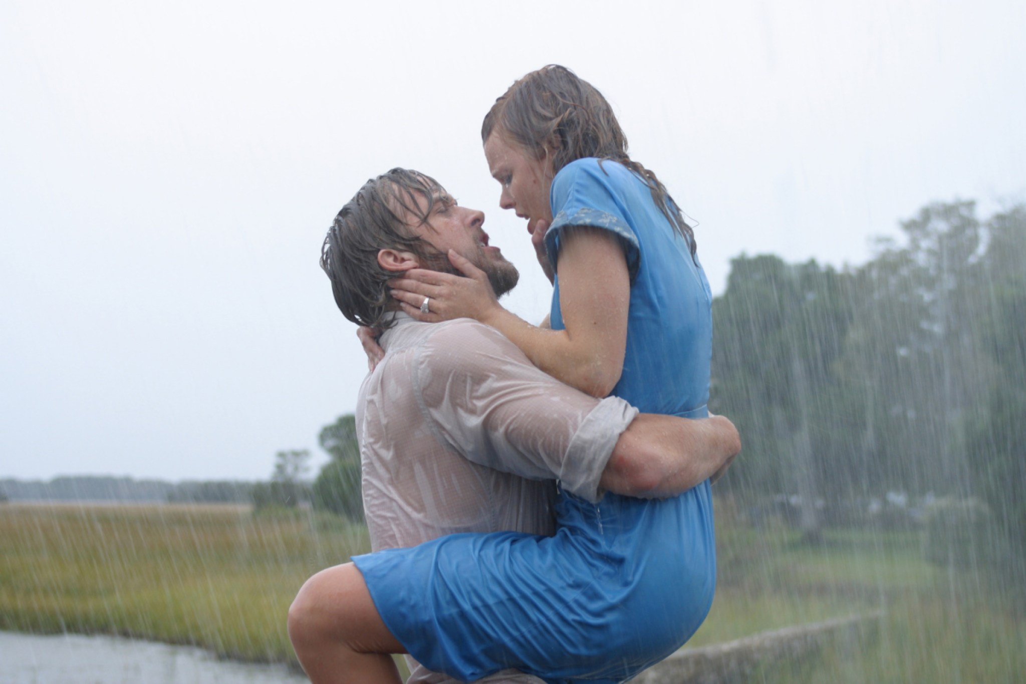 Ryan Gosling holds Rachel McAdams in the rain from The Notebook