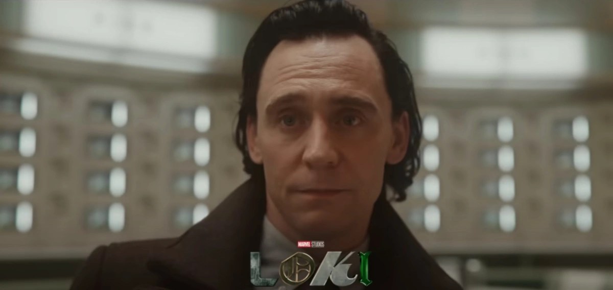 A close up of Tom Hiddleston as Loki in Loki season 2. The Loki logo is at the bottom of the image.