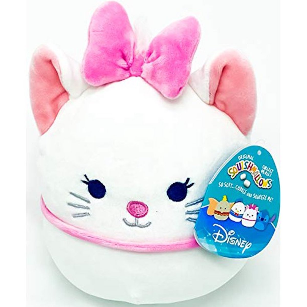 A white cat Squishmallow with a pink bow and collar