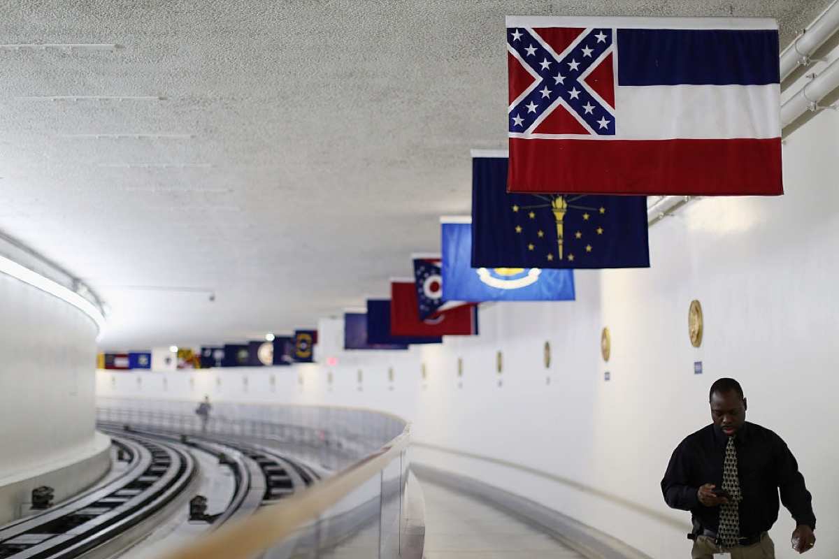 The state flag of Mississippi, which incorporates the flag of the Confederate States of America in the top left corner, is displayed with the flags of the other 49 states and territories in the tunnel connecting the senate office building and the U.S. Capitol.