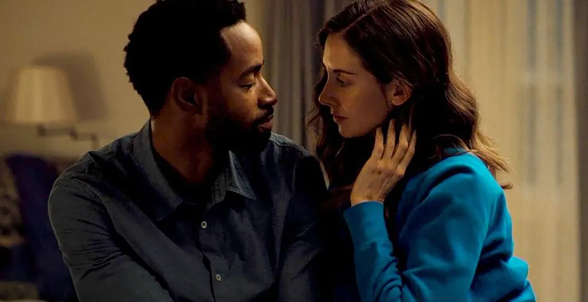 Jay Ellis and Alison Brie almost kissing in Somebody I Used to Know