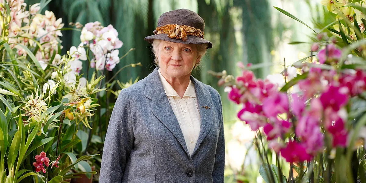Julia McKenzie in Agatha Christie's Marple surrounded by flowers 