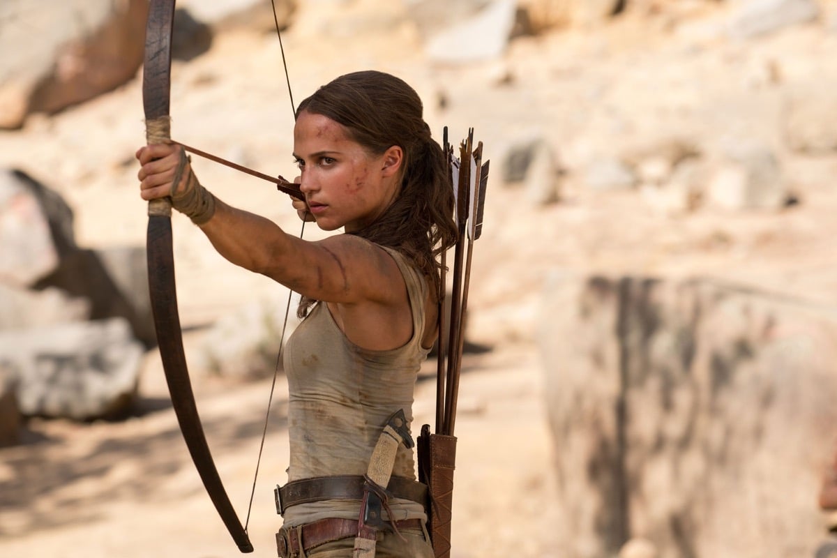 Lara Croft (Alicia Vikander) readies her bow and arrow in 'Tomb Raider'