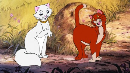 Duchess, a white cat, talks with Thomas, an orange cat, in the animated movie 'The Aristocats'