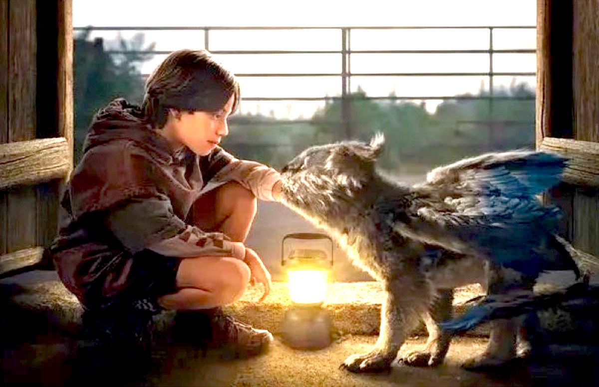 A child and small fantasy creature look into each other's eyes on Netflix's Chupa poster.