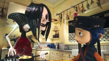 The Other Mother looms over Coraline with a menacing smile (Focus Features)