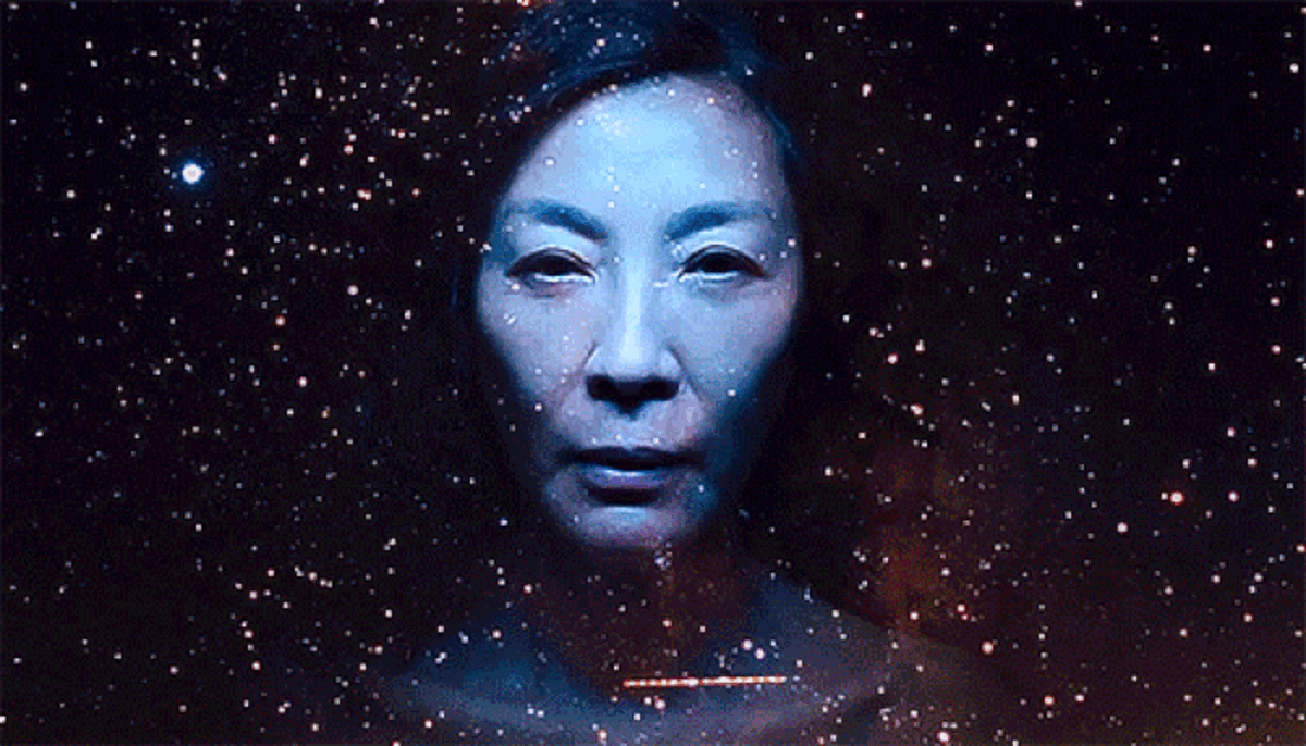An animated GIF of Michelle Yeoh as multiple versions of Evelyn Wang in Everything Everywhere All At Once