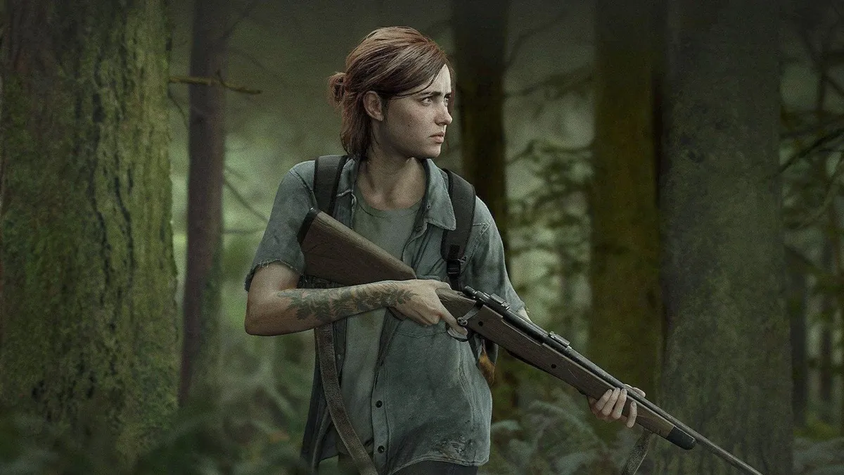 Ellie carries a gun in the woods in 'The Last of Us Part II'