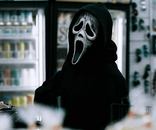 Ghostface holding a gun in Scream VI