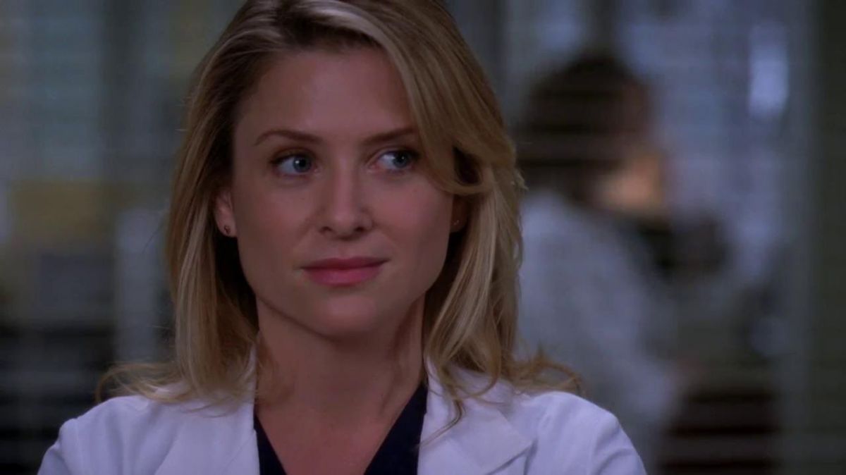 A close up of Arizona Robbins in her doctor coat
