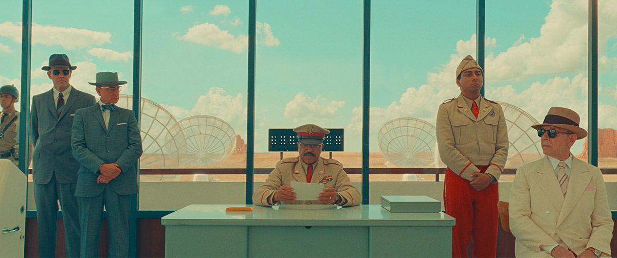 Jeffrey Wright at a desk in Asteroid City