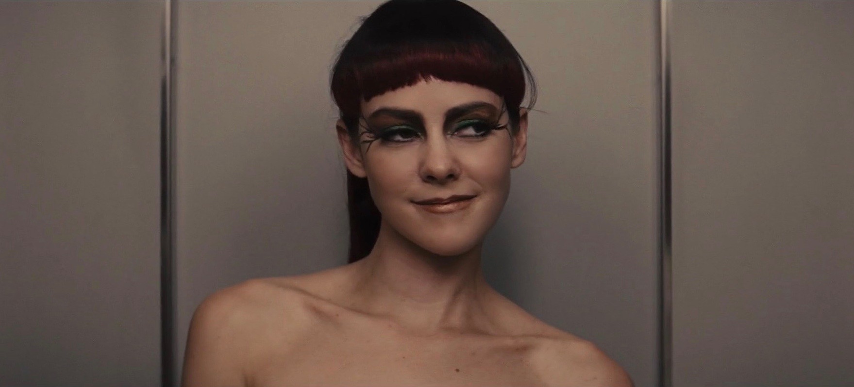 Johanna Mason smirking in the Hunger Games